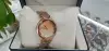 A beautiful ladies' watch with blurred yellow sand patterns and dazzling colors Specification image